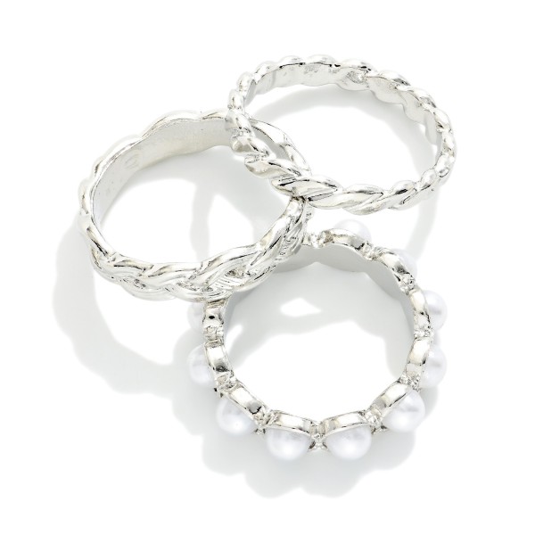 Set Of Three Stackable Rings Featuring Metal Tones & Pearls 

- Size 6.5 - 7.5
