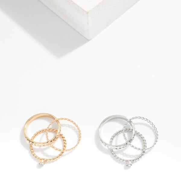 Set Of Three Stackable Rings Featuring Metal Tones & Rhinestone 

- Size 7-8 