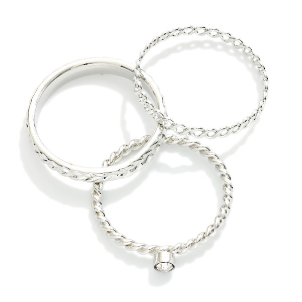 Set Of Three Stackable Rings Featuring Metal Tones & Rhinestone 

- Size 7-8 