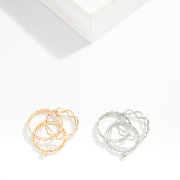 Set Of Three Stackable Rings Featuring Metal Tones & Rhinestone 

- Size 7- 8.5