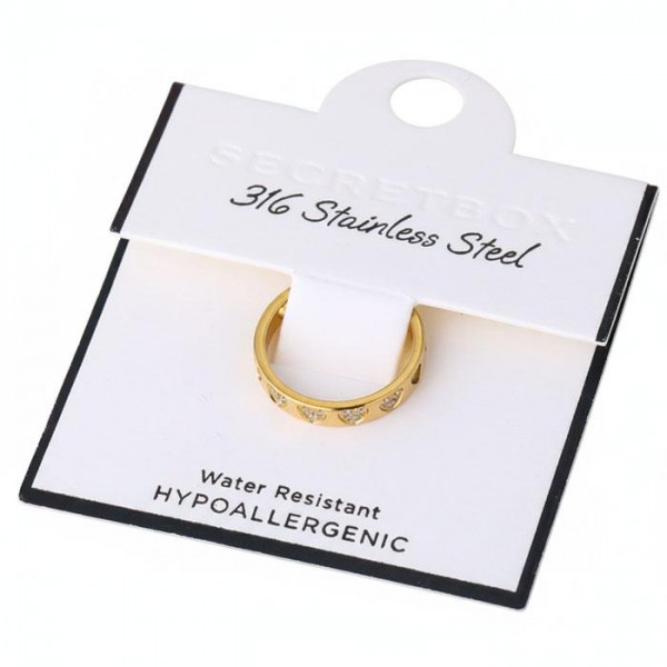 Metal Tone Ring With Rhinestone Heart Details 

- Stainless Steel
- Water Resistant
- Size 7.5