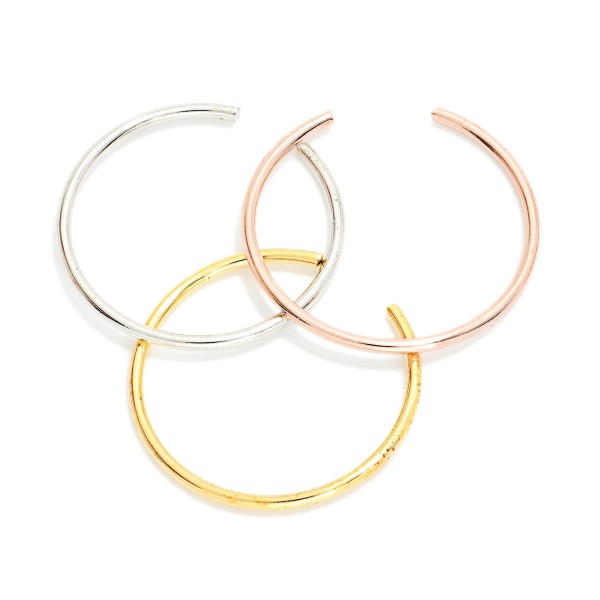 Set Of Three Skinny Metal Rings

- Gold Dipped 
- Size 7 