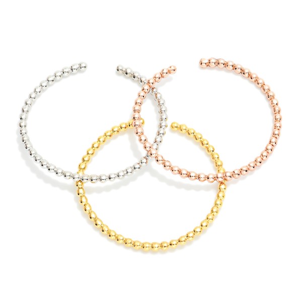 Set Of Three Metal Tone Bubble Rings 

- Gold Dipped 
- Size 7 
