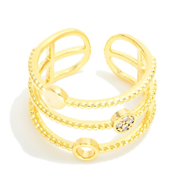 Layered Ribbed Metal Ring With Circle Details 

- Gold Dipped 
- Size 7 