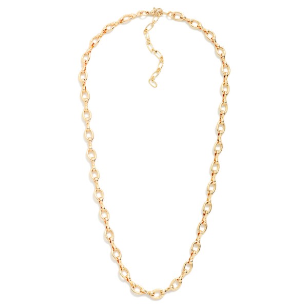 Dainty Link Chain Necklace with fine, delicate links that lay beautifully at the collarbone. Perfect on its own for a minimal look or layered with pendants and chokers for a stacked style. Finished with a lobster clasp and extender chain. A simple, versatile essential at an easy price point that makes a great gift and a reliable everyday seller.