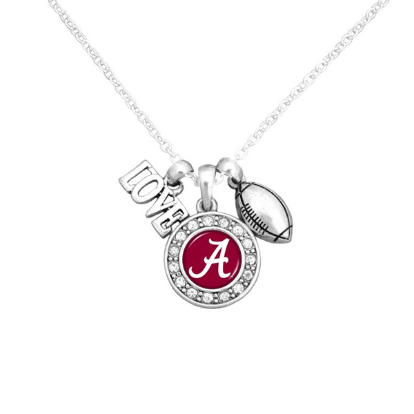 Officially licensed 16" Silver tone chain necklace featuring a cluster pendant with a "Love" and football charm and a round Alabama logo surrounded with crystal clear rhinestones. 