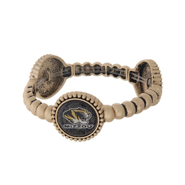 Officially licensed gold tone University of Missouri stretch bracelet with three stations. Our exclusive design.