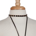 Black cord layered choker necklace with gold tone hardware. Approximately 14" in length.