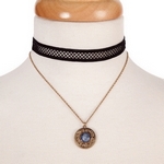 Black and gold tone, double layer choker with a circle pendant, accented by a blue stone. Approximately 12" in length.