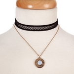 Black and gold tone, double layer choker with a circle pendant, accented by an opal stone. Approximately 12" in length.