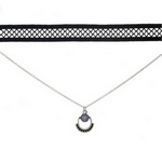 Black and silver tone, double layer choker with an opal stone pendant. Approximately 12" in length. 