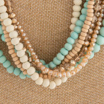 Wholesale layered necklace wood iridescent beaded details