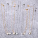 White Gold Dipped Pearl Collar Necklace.

- Pearl 5.5mm
- Approximately 14" Long 
- 1" Adjustable Extender