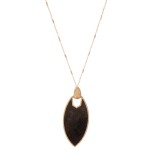 Long Necklace Featuring Metal Encased Animal Print Pendant.

- Pendant 3" 
- Approximately 38" L 
- 3" Adjustable Extender