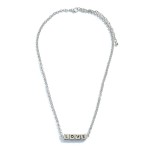 Love Block Letter Necklace.

- Approximately 16" in Length
- 3" Adjustable Extender