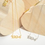 Gold Dipped 1994 Birth Year Necklace Featuring CZ Accents.

- Gold Dipped
- Adjustable Lengths: 15.5", 16.5", and 17.5"