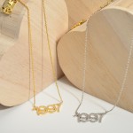 Gold Dipped 1997 Birth Year Necklace Featuring CZ Accents.

- Gold Dipped
- Adjustable Lengths: 15.5", 16.5", and 17.5"