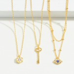 Petite Gold Dipped Necklace With Geometric Charm and Rhinestone Center

- Approximately 16" Length