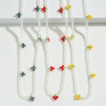 Translucent Beaded Necklace Featuring Beaded Fruit Accents

- Approximately 15" Long
- Extender Approximately 2.5" Long