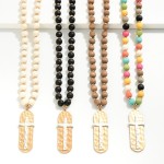 Wood Beaded Necklace With Hammered Cross Pendant 

- Approximately 28 " L
- Extender 3" L
- Pendant 2.25" L / 0.75" W 