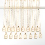 Gold Tone Chain Link Necklace With Enamel and Pearl Initial Pendant.

- Approximately 16" L
- Extender 2.5" L