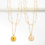 Layered Chain Link Necklace Featuring Daisy Chain and Flower Pendant.

- Approximately 16" L
- Extender 3" L