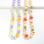 Wood Beaded Necklace Featuring Painted Porcelain Beads 

- Approximately 14" L