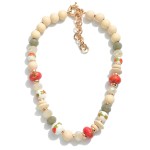 Wood Beaded Necklace Featuring Painted Porcelain Beads 

- Approximately 14" L