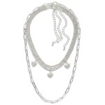 Choker/Collar Set Featuring Rhinestone, Heart and Chain Link Necklaces 

- Set of 3 Necklaces 
- Approximately 10"-15" L
- Extenders 3" L