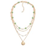 Layered Chain Link Necklace Featuring Pitted Metal Charm With Daisy and Pearl Details

- Approximately 16" L
- Extender 3" L