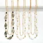 Layered Chain Link Necklace Featuring Natural Stone Beads

- Approximately 16" L
- Extender 3" L