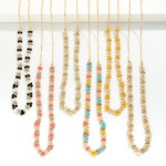 Chain Link Necklace Featuring Multi-tone Faceted Beaded Details

- Approximately 16" L
- Extender 3" L