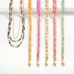 Triple Strand Necklace Featuring Heishi And Chain Link Details

- Approximately 16" L
- Extender 3" L