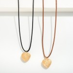 Braided Necklace With Heart Pendant And Tassel Detail

- Approximately 18" L
- Knotted Closure 