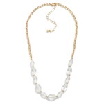 Chain Link Necklace Featuring Faceted Tapered Bead Details

- Approximately 18" L
- Extender 3" L