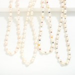 Pearl Beaded Necklace

- Approximately 15" L
- Extender 2" L