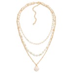 Layered Chain Link and Beaded Necklace Featuring Enamel Shell Pendant 

- Approximately 16" L
- Extender 3" L 