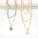 Layered Chain Link and Beaded Necklace Featuring Enamel Shell Pendant 

- Approximately 16" L
- Extender 3" L 