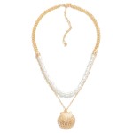 Layered Chain Link Necklace With Pearl Beads and Shell Pendant

- Approximately 16" L
- Extender 3" L