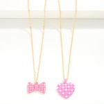 Chain Link Necklace Featuring Pearl Studded Cushion Bow Pendant

- Approximately 16" L
- Extender 3" L