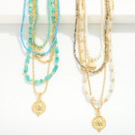 Layered Beaded & Chain Link Necklaces Featuring Heart and Hammered Metal Pendants 

- Approximately 19" L
- Extender 3" L