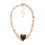 Stone Beaded Necklace Featuring Glass Heart Pendant 

- Approximately 14" L
- Extender 3" L