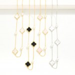 Gold Dipped Chain Link Necklace Featuring Clover & Pearl Stations 

- Approximately 15" L
- Extender 2" L