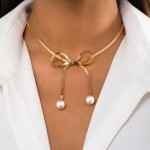 Metal Tone Herringbone Chain Link Bow Necklace With Pearl Details 

- Approximately 14" L
- Extender 3" L