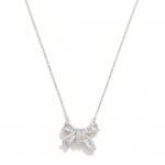 Metal Tone Dainty Chain Link Necklace With Cubic Zirconia Studded Bow Pendant 

- Approximately 16" L
- Extender 2.5" L 