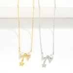 Gold Dipped Dainty Chain Link Necklace Featuring Rhinestone Bow & Star Pendant 

- Approximately 16" L
- Extender 2" L