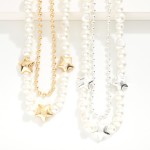 Layered Pearl and Metal Tone Beaded Necklace With Metal Tone Star Beads

- Approximately 16" L
- Extender 3" L