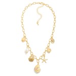 Chain Link Charm Necklace Featuring Porcelain, Pearl, & Metal Tone Charms 

- Approximately 16" L
- Extender 3" L