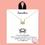 Dainty Chain Link Necklace Featuring Cubic Zirconia Crab Pendant 			
					
- Approximately 16" L					
- Extender 2" L					
- Made in Korea					
- Hypoallergenic Brass Base					
- 18K Gold Dipped		
			
- Card: "I may not be walking straight, but I can sure dance sideways like no one else can. And that’s okay, because no journey is ever straightforward."					