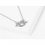 Dainty Chain Link Necklace Featuring Metal Tone Knotted Metal Pendant 

- Gold Dipped 
- Approximately 15.5" L
- Extender 2" L